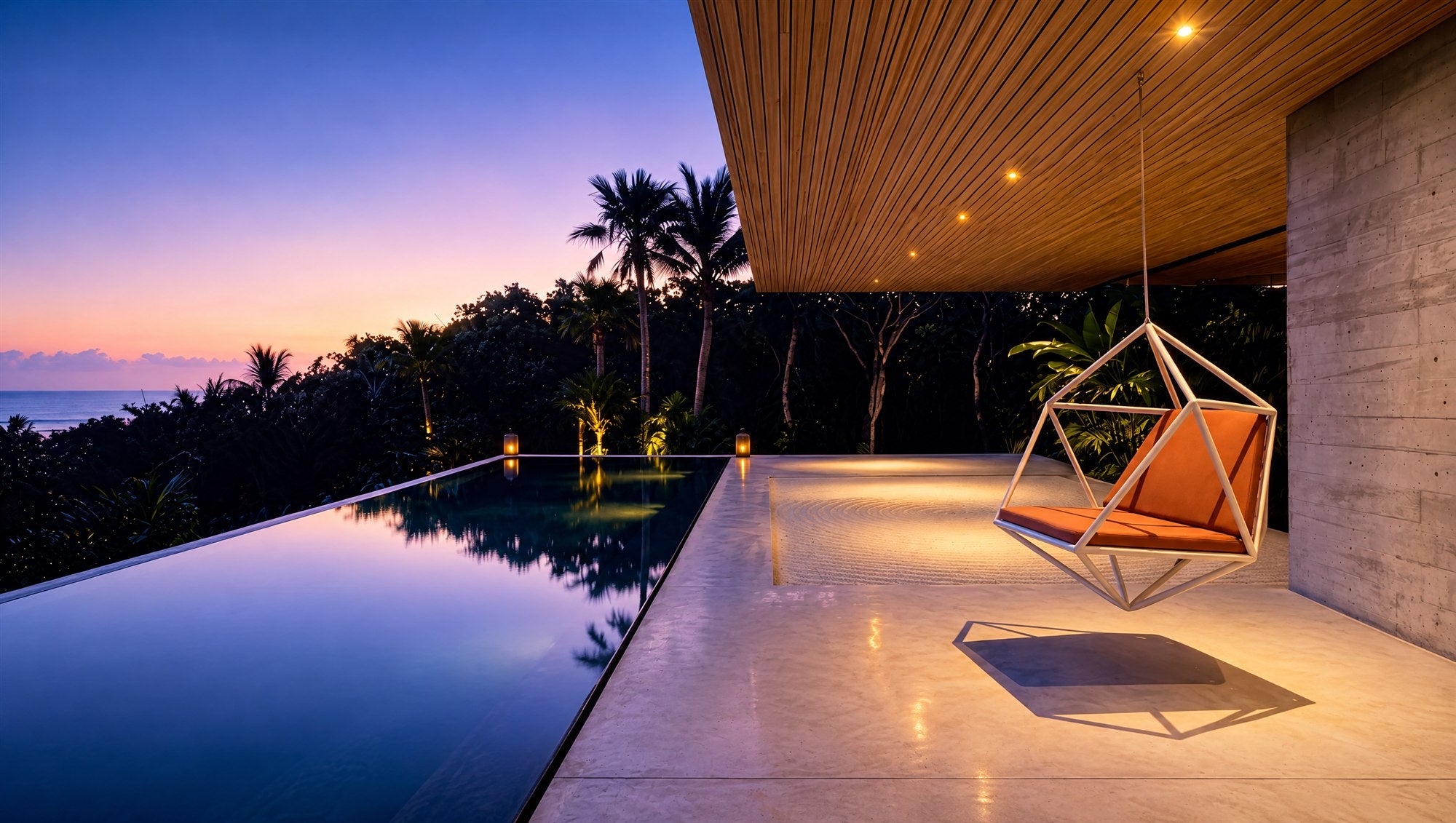 Koza 3 hanging from a single point on a concrete terrace beside an infinity pool at dusk